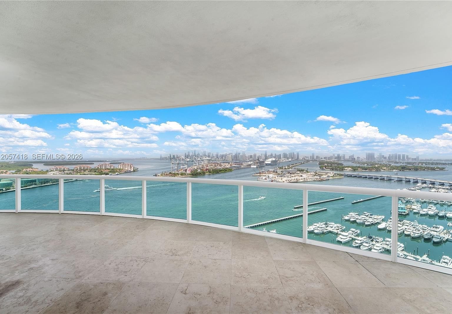 sweeping wraparound terrace with bay and skyline panorama