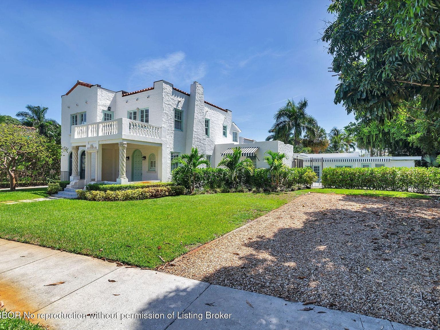 classic 1925 Mediterranean facade, lawn and balcony