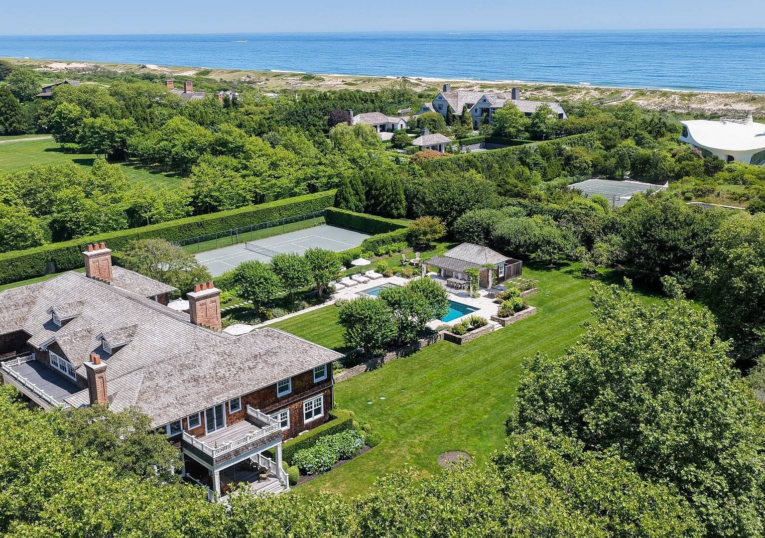 aerial - estate with tennis court, pool, house, Atlantic beyond