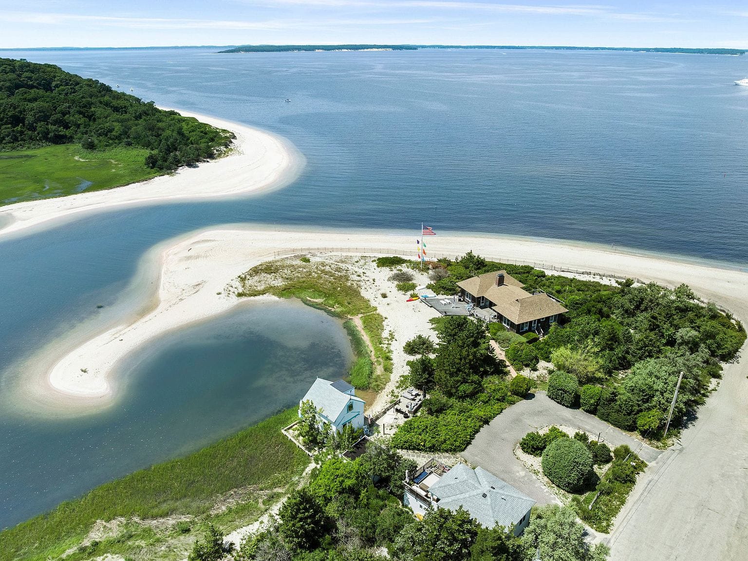 the full bayfront peninsula wrapped by sand and water
