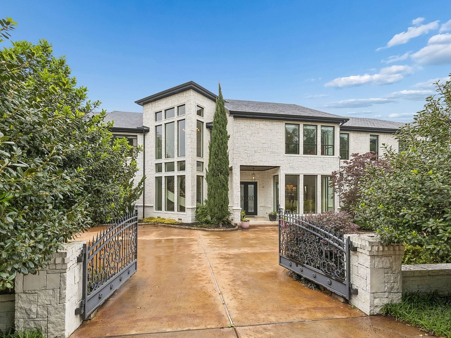 elegant Bluffview estate framed by landscaped grounds