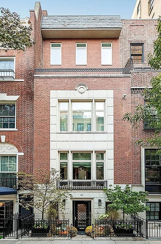 classic brick and limestone townhouse facade